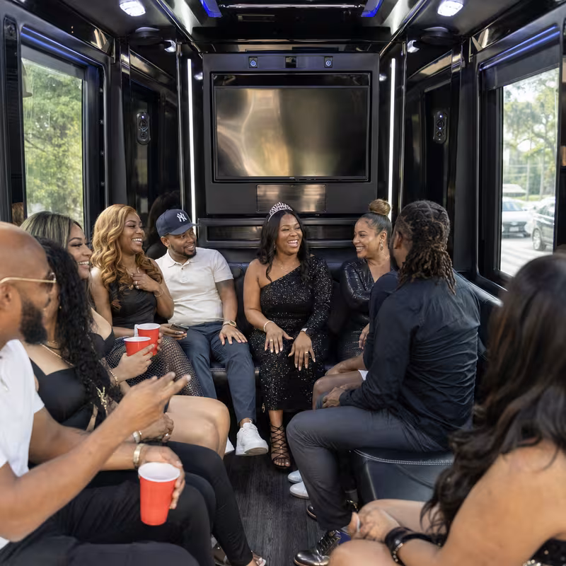 Black Mercedes Sprinter van staged for an Greensboro Birthday Transportation group