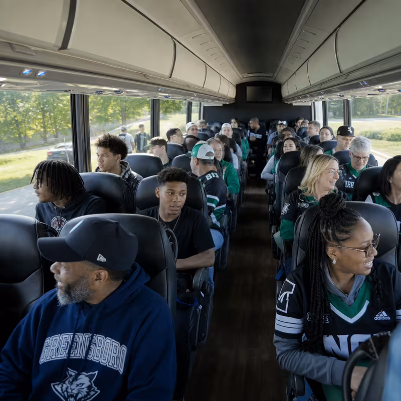Passenger seating aboard a Greensboro party bus rental