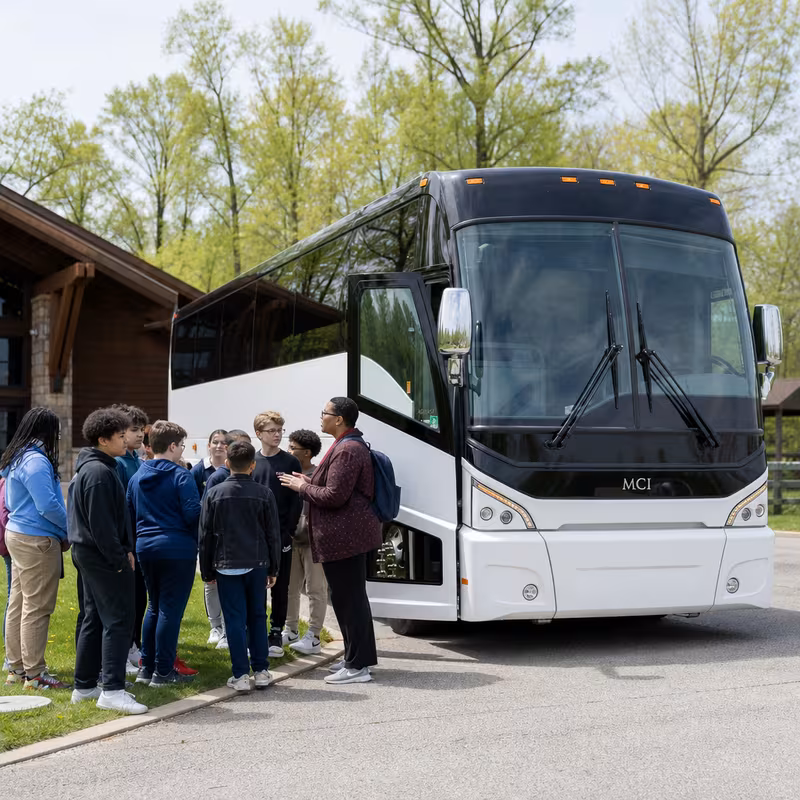 Black Mercedes Sprinter van staged for an Greensboro School Transportation group