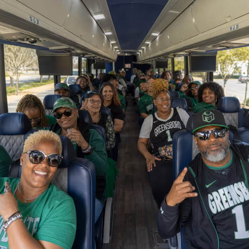 Black Mercedes Sprinter van staged for an Greensboro Sporting Event Transportation group